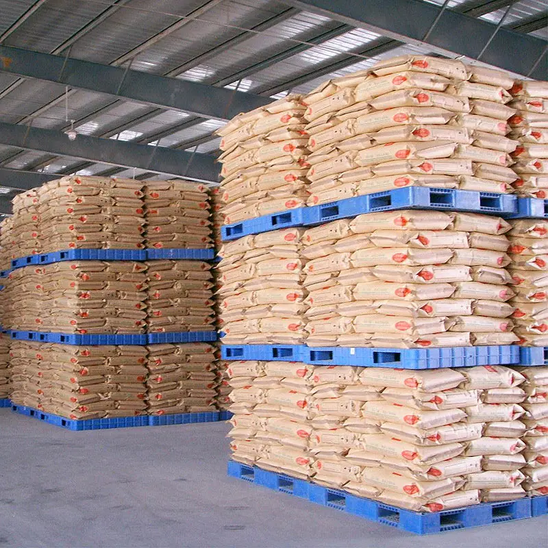 Pallets stacked with industrial bags of PVC. Illustrating packaging and palletization as part of PVC to Europe & Carbon Transparency: Ensuring EU Compliance, Supplier Declarations, Chain of Custody, Carbon Data, Traceability, Audits, Documentation, and Updates.