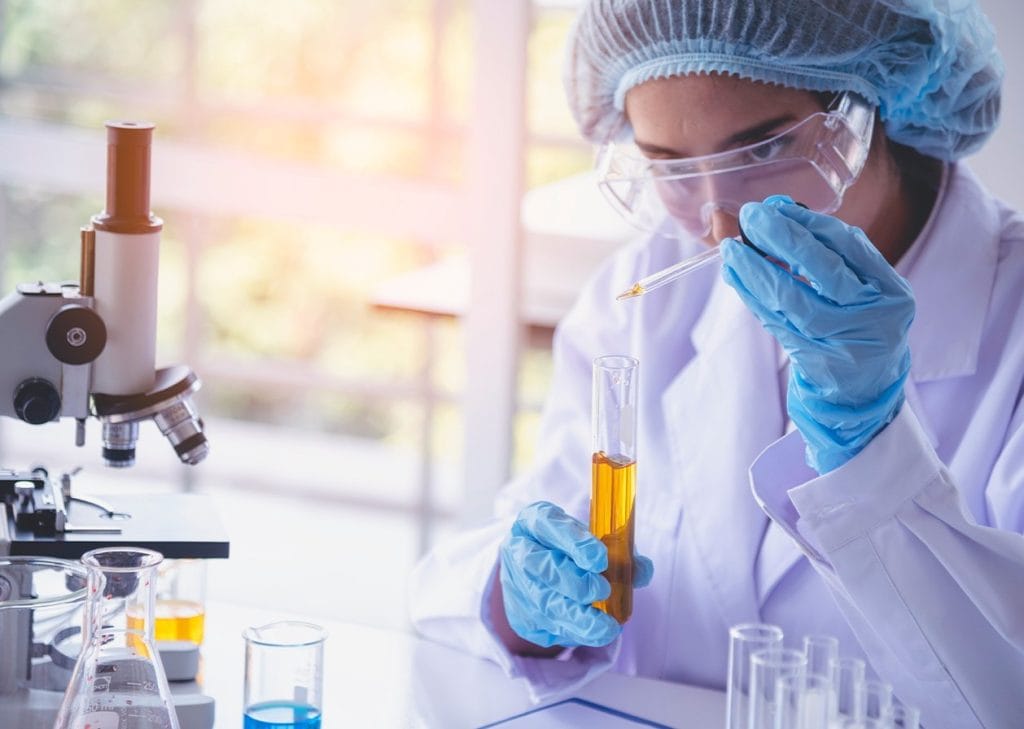 Close-up of a Certificate of Analysis (COA) for industrial chemicals, showing specification details.