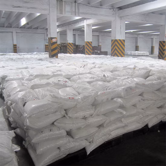 Pallets stacked with 25 kg bags of caustic soda, shrink-wrapped for secure transport.