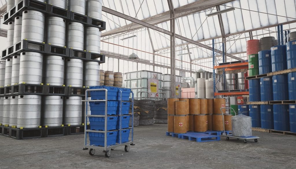 Industrial drums of chemicals packaged on a pallet, ready for shipping and logistics.
