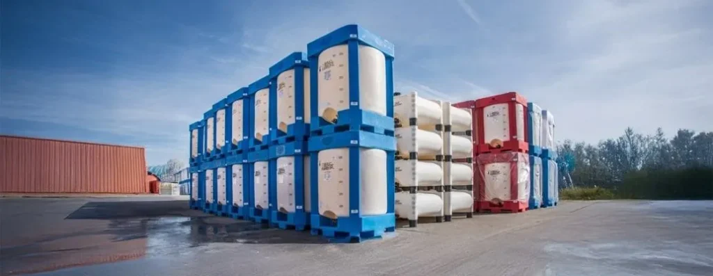 Stacked Intermediate Bulk Containers (IBCs) for efficient chemical storage and transport.