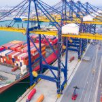 Container shipping operations for petrochemical exports, highlighting global logistics and international trade flow.