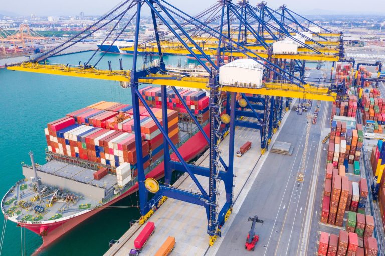 Container shipping operations for petrochemical exports, highlighting global logistics and international trade flow.